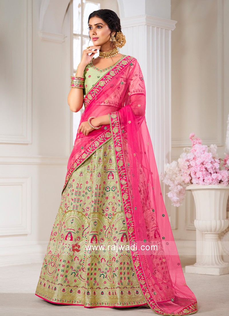 Lovely Pista Green Georgette Lehenga Choli with Sequence and Thread Work.