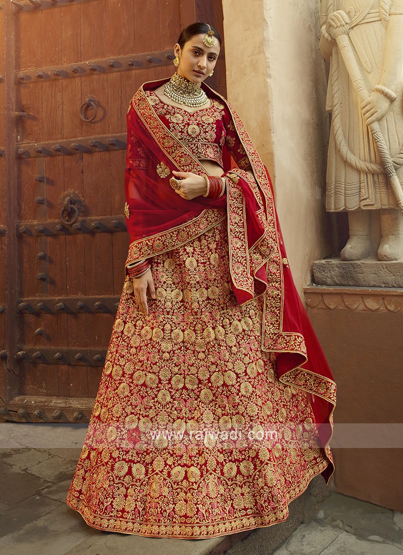 Beckoning Velvet Pink and Teal Embroidered Designer Lehenga Choli