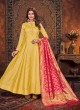 Yellow Art Silk Salwar Kameez with Pink Dupatta