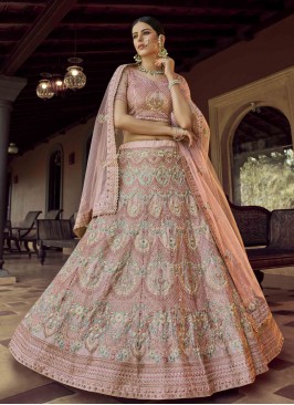 Engrossing Faux Georgette Peach Sequins Lehenga Choli