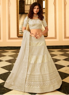 Enthralling Patch Border Cream Lehenga Choli