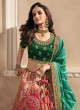 Peach & Green Woven Banarasi Silk Lehenga Choli