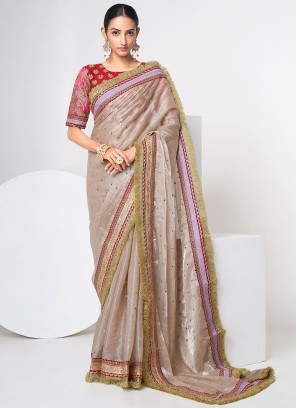 Shimmering Cream Designer Organza Saree