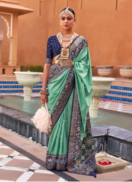 Lovely Pista Green And Blue Patola Printed Silk Saree