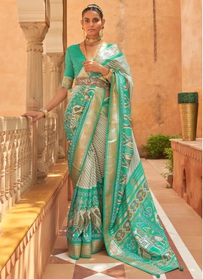 Pista Green Saree In Dola Silk With Woven Buttis And Floral Weave On Pallu