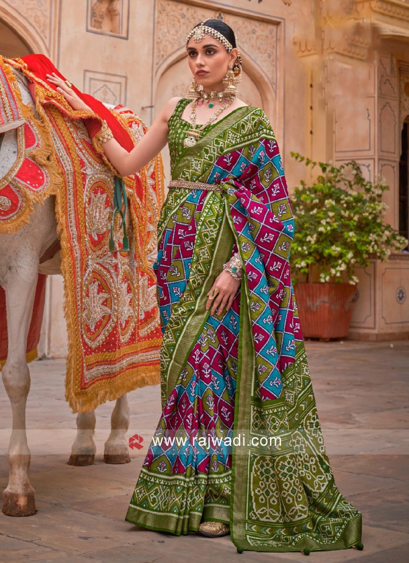 Enrich Mehandi Green Weaving Silk Saree With Green With Black Color Border  Blouse