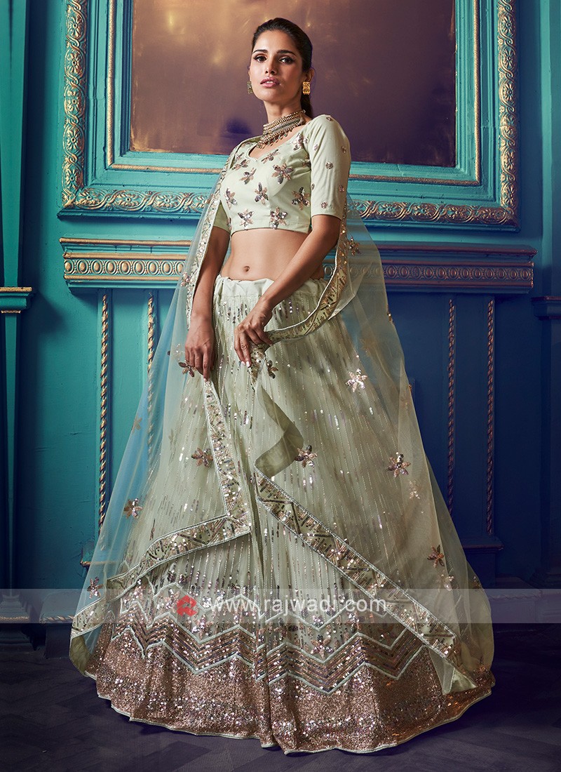 Turquoise colour Ombre Georgette Embroidered Lehenga.