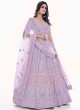 Lilac Sequins and Zircon Embellished Net Lehenga Choli