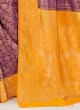 Mesmerizing Dark Purple And Yellow Color Banarasi Silk Saree