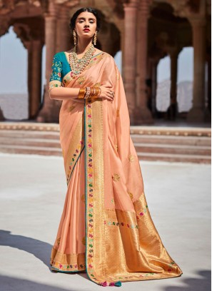 Peach Floral Motifs Traditional Wear Silk Saree