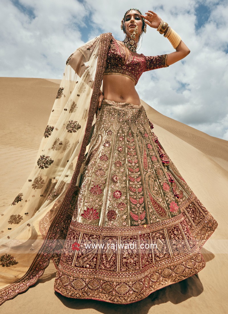 pista green and maroon bridal lehenga in velvet with heavy embroidered work 40175