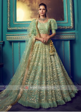 Ruffle Work Net Lehenga Choli