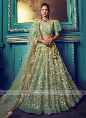 Ruffle Work Net Lehenga Choli