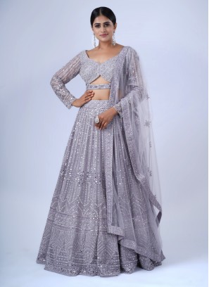 Striking Light Purple Heavy Embroidered Lehenga In Net