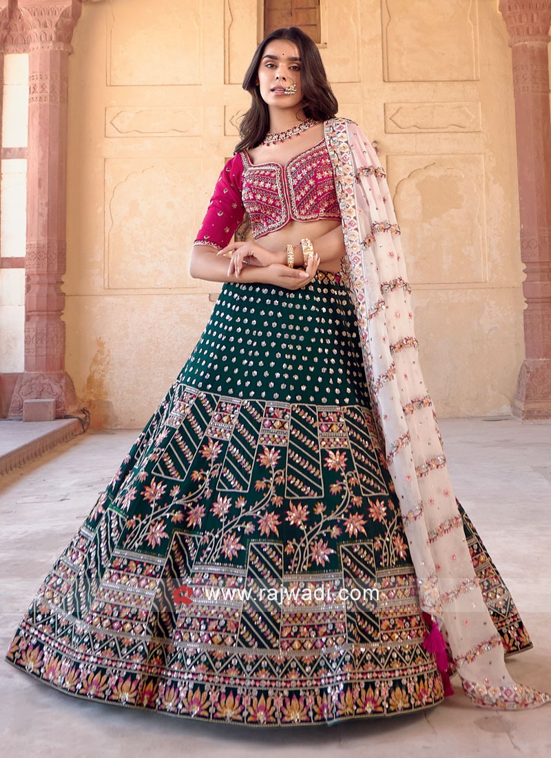 Bride Wearing Pink Lehenga and Groom in Navy Sherwani