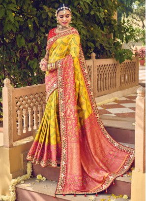 Traditional Wear Silk Fabric Yellow And Pink Saree