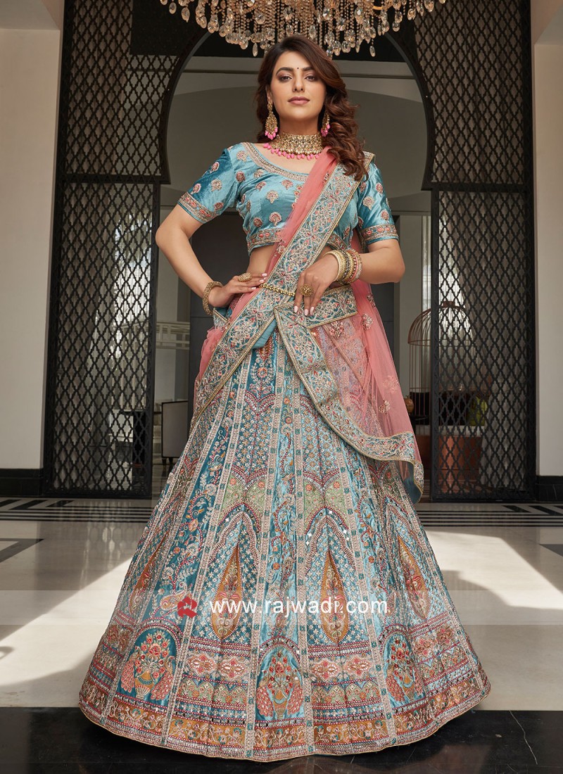 https://cdn.rajwadi.com/image/cache/data/turquoise-sequins-engagement-a-line-lehenga-choli-35930-800x1100.jpg