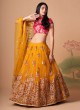 Vibrant Mustard Yellow Net Embroidered Lehenga Choli