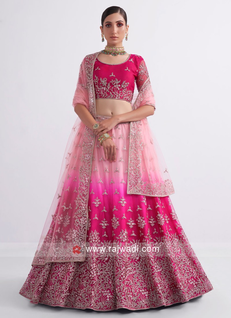 Shaded Pink Heavy Embroidered Net Wedding Lehenga Choli